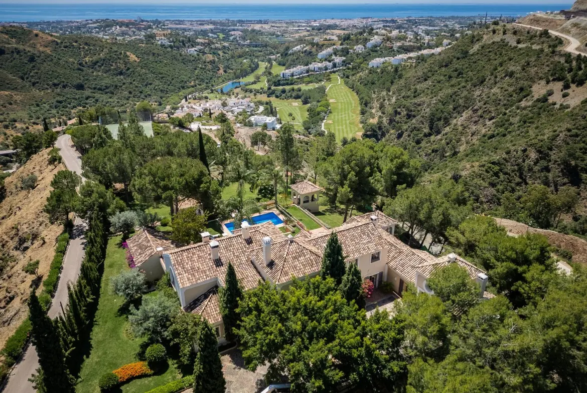 Aerial overview of a classic El Madroñal estate and the Mediterranean coast